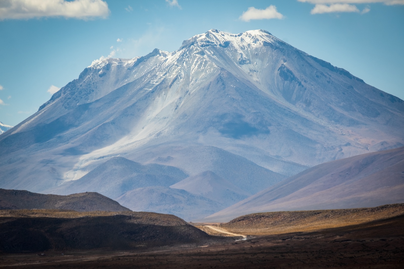 High-altitude volcano above the Andean plateau